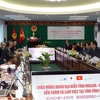 Representatives from Vinh Long province and Japan's Niigata pefecture at the meeting on August 5. (Photo: VNA)