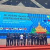 Minister of Health Dao Hong Lan ( fifth, from left) is with her counterparts from other ASEAN countries at the 16th ASEAN Health Ministers Meeting and related meetings held in Vientiane from August 7-9. (Photo: VNA)