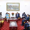 Minister of Labour, Invalids and Social Affairs Dao Ngoc Dung meets with Romanian Ambassador to Vietnam Cristina Romila on August 13. (Photo: molisa.gov.vn)