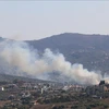 Smoke is seen after an Israeli strike on Kafr Kila, Lebanon on July 29. (Photo: VNA)