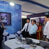 A booth of a digital technology enterprise displays products and technology solutions. The draft Law on Digital Technology Industry will create a legal framework to promote the development of the industry. (Photo: VNA) 