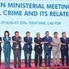 Representatives from ASEAN countries at the 18th ASEAN Ministerial Meeting on Transnational Crime (AMMTC-18) held in Laos. (Photo: VNA) 