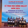 Students receive Vallet scholarships granted by the scientific and educational organisation "Meeting Vietnam". (Photo: VNA)