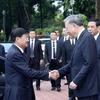 President To Lam welcomes Lao Party General Secretary and President Thongloun Sisoulith in Hanoi on July 25, 2024. (Photo: VNA)