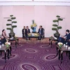 Deputy Secretary of the city Party Committee and Chairman of the municipal People's Committee Phan Van Mai receives the Lao delegation on September 26. (Photo: VNA)