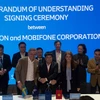 Representatives from Ericsson and MobiFone signed the MoU. (Photo courtesy of Ericsson) 