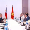 Vietnamese Prime Minister Pham Minh Chinh (second, left) meets with Philippine President Ferdinand Romualdez Marcos Jr. (third, right) in Vientiane, Laos, on October 8. (Photo: VNA)