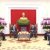 At the meeting between Politburo member and Permanent member of the Communist Party of Vietnam Central Committee's Secretariat Luong Cuong (right) and newly-appointed Chinese Ambassador to Vietnam He Wei. (Photo: VNA)