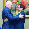 Vietnamese Prime Minister Pham Minh Chinh (right) and his New Zealand counterpart Christopher Luxon. (Photo: VNA)