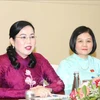 Chairwoman of the National Assembly (NA)'s Committee for Deputy Affairs Nguyen Thanh Hai (left) speaks at the meeting with President of the Lao Commission on the Affairs of the NA’s Members Souban Savabouth. (Photo: VNA)