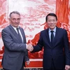 Minister of Public Security General Luong Tam Quang (right) meets with Secretary-General of the Communist Party of Spain (PCE) Enrique Fernando Santiago Romero. (Source: VNA)