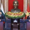 President Luong Cuong and his Bulgarian counterpart Rumen Radev co-chair a press conference following their talks in Hanoi on November 25. (Photo: VNA)