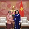 National Assembly (NA) Vice Chairwoman Nguyen Thi Thanh (right) and Lao Ambassador to Vietnam Khamphao Ernthavanh (Photo: daibieunhandan.vn)