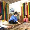 Phu Tan sedge mat craft village in Tuy An district, Quang Nam province, builds a rural tourism model associated with OCOP products. (Photo: VNA)