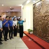 A bas-relief artwork on the Dien Bien Phu Victory is launched at the Dien Bien Phu Victory Museum in the northwestern province of Dien Bien on May 4 (Photo: VNA)