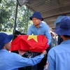 The ceremony on June 28 to receive the remains of 172 Vietnamese volunteer soldiers who fell down in Cambodia during the wartime. (Photo: VNA)