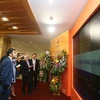 Foreign investors at an event in the Hanoi Stock Exchange (HNX). ( Photo courtesy of HNX)