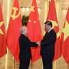 General Secretary of the Communist Party of Vietnam Central Committee Nguyen Phu Trong (L) meets his Chinese counterpart Xi Jinping in Beijing in October 2022 (Photo: VNA)