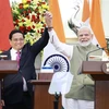 Prime Minister Pham Minh Chinh (L) and his Indian counterpart Narendra Modi at the joint press conference on August 1, 2024. (Photo: VNA)