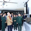 Timor-Leste President Jose Ramos-Horta (3rd from right) visits the Military-run telecom group Viettel. (Photo: VNA)