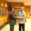 National Assembly Vice Chairman Nguyen Khac Dinh (L) meets with Malaysian Deputy Prime Minister Haji Fadillah bin Haji Yusof on August 7. (Photo: VNA)