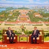 General Secretary of the Communist Party of Vietnam Central Committee, President of Vietnam To Lam (L) and his Chinese counterpart Xi Jinping (Photo: VNA)