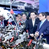 Prime Minister Pham Minh Chinh visits the Vietnam International Innovation Expo 2023 (VIIE 2023) in Hanoi last October. (Photo: VNA)