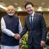 Indian Prime Minister Narendra Modi (L) and his Singaporean counterpart Lawrence Wong (Photo: https://www.businesstimes.com.sg/)