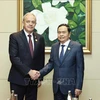 National Assembly Chairman Tran Thanh Man (R) shakes hands with Chairman of the House of Representatives of the National Assembly of Belarus Igor Sergeyenko. (Photo: VNA)