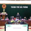 Bulgarian President Rumen Radev (standing) speaks at the working session with Secretary of the Hai Phong Party Committee Le Tien Chau on November 26. (Photo: VNA)