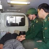 Binh Dinh's Border Guard medical workers conduct an initial health check-up for the foreign sailor. (Photo: Binh Dinh Newspaper)