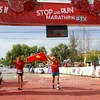 Athletes finish the 42km distance at the Stop And Run Marathon BTV Binh Thuan 2024. (Photo: VNA)