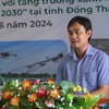 Director of the provincial Department of Agriculture and Rural Development Nguyen Van Vu Minh speaks at the event. (Photo: VNA)