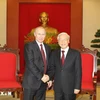 Party General Secretary Nguyen Phu Trong (right) receives President Vladimir Putin who is on a state visit to Vietnam in November 2013. (Photo: VNA)