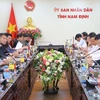 A delegation of Japanese parliamentarians and businesses holds working session with leaders of Nam Dinh province on July 4 (Photo: VNA)