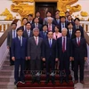 El viceprimer ministro Tran Luu Quang y los delegados. (Fuente: VNA)