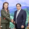 El primer ministro vietnamita, Pham Minh Chinh, y la ministra de Relaciones Exteriores, Comercio Internacional y Culto de Argentina, Diana Mondino. (Fuetne: VNA)