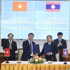 Firma un acuerdo de cooperación entre las entidades relevantes de Vietnam y Laos. (Fuente: most.gov.vn) 