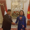 El recién juramentado presidente de Indonesia, Prabowo Subianto, con la vicepresidenta vietnamita, Vo Thi Anh Xuan. (Fuente: VNA)