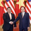 El presidente de la Asamblea Nacional de Vietnam, Tran Thanh Man, y el titular de la Cámara de Representantes de Malasia, Tan Sri Dato' Johari Bin Abdul. (Fuente: VNA)