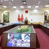 越南农业与农村发展部工作代表团与平顺省人民委员会举行的工作会议。图自越通社