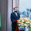 沙特阿拉伯驻越大使馆临时代办哈穆德·纳伊夫·阿尔穆泰里在活动上发言。图自越通社