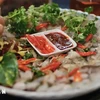 美食节展示越南各地丰富多样的典型美味菜肴。图自越通社