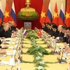 越共中央总书记阮富仲与俄罗斯总统弗拉基米尔·普京的会谈场景。图自越通社