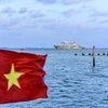 越南国旗2023年4月在长沙群岛生存东岛上飘扬。图自baoquocte.vn