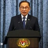 马来西亚总理安瓦尔·易卜拉欣2023 年 11 月 5 日在布城举行的新闻发布会上发表讲话。图自法新社/越通社