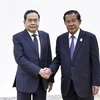 Le président de l'Assemblée nationale, Tran Thanh Man (gauche), et le président du Parti du peuple cambodgien (PPC) et président du Sénat cambodgien, Samdech Techo Hun Sen. Photo: VNA