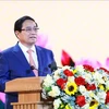 Le Premier ministre Pham Minh Chinh prend la parole à l'occasion du 60e anniversaire de la victoire de Binh Gia. Photo : VNA