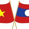 Drapeaux nationaux du Vietnam et du Laos. Photo : sggp.org.vn