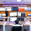 Traders work on a trading floor in MXV. (Photo: mxv.com.vn)